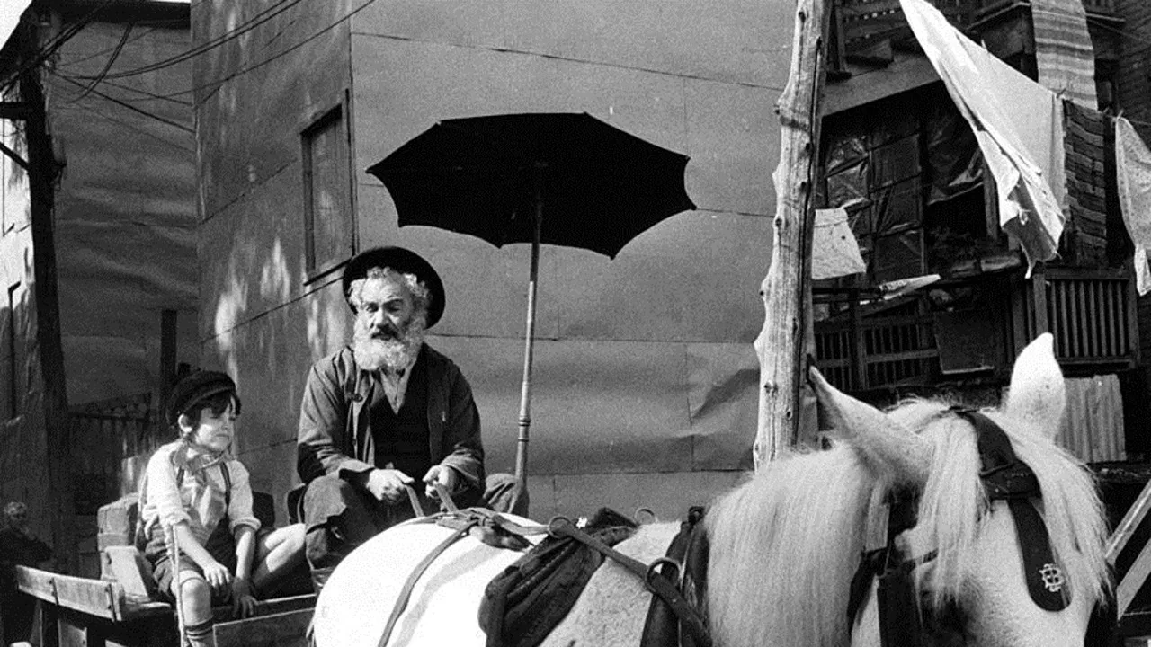 Lies My Father Told Me backdrop