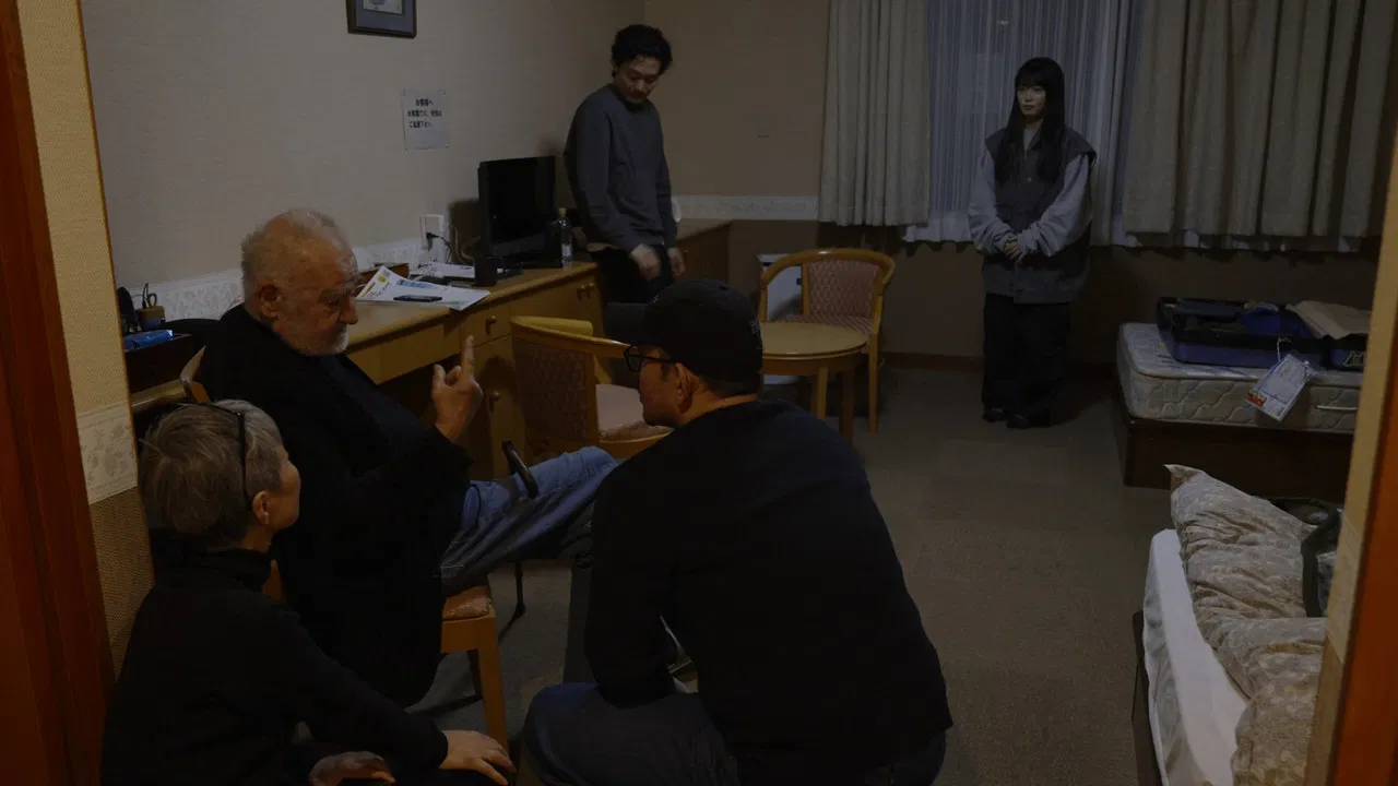 FUKUSHIMA with BÉLA TARR backdrop