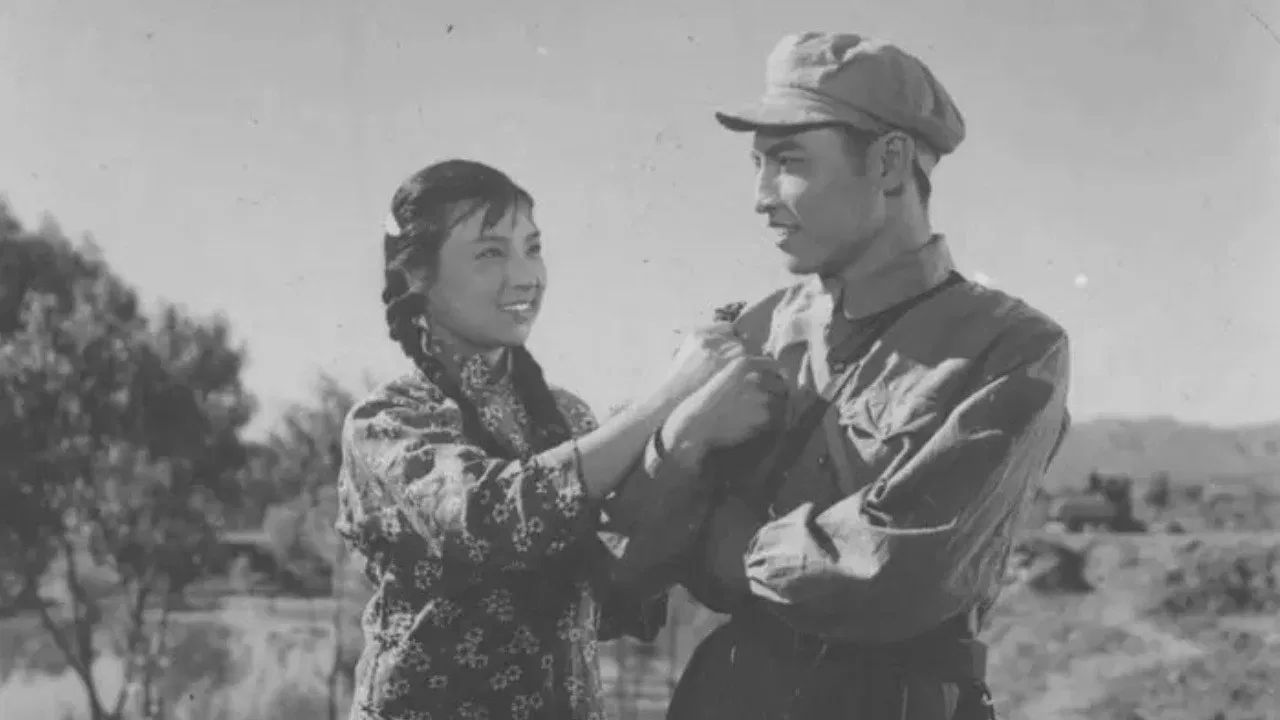 In front of the letter backdrop