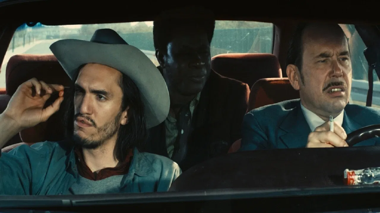 Robert Mitchum Est Mort backdrop