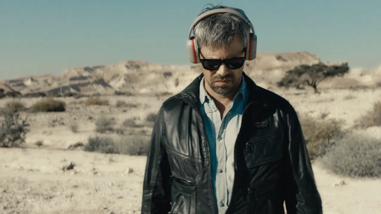 Ahed's Knee backdrop