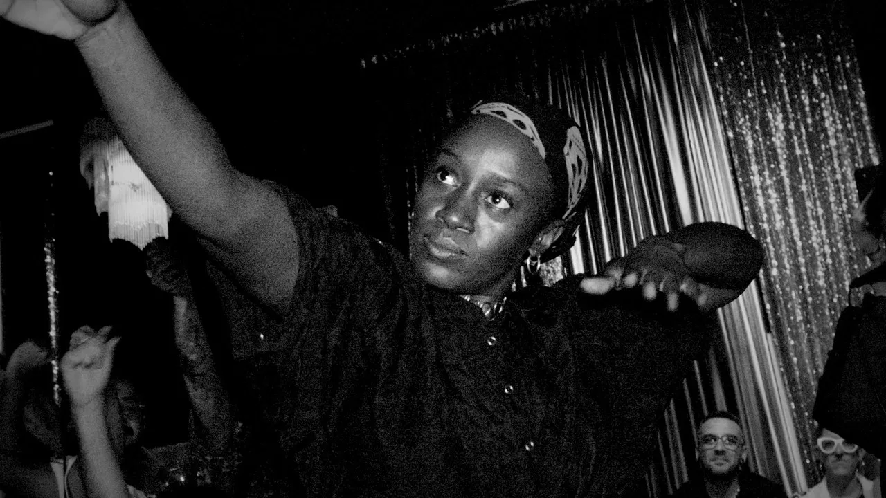 Intruder on a ballroom backdrop