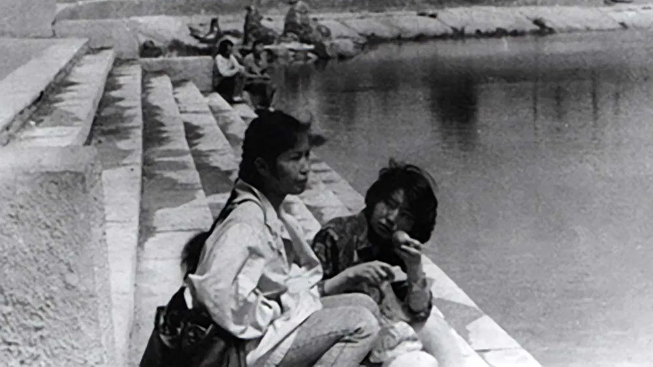 At the Foot of a Bare Mountain backdrop