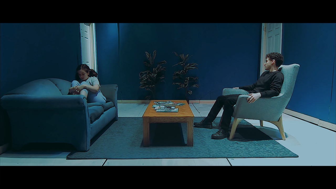 The Con Artist backdrop