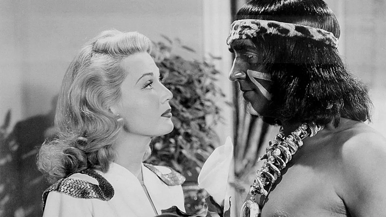 Her Primitive Man backdrop