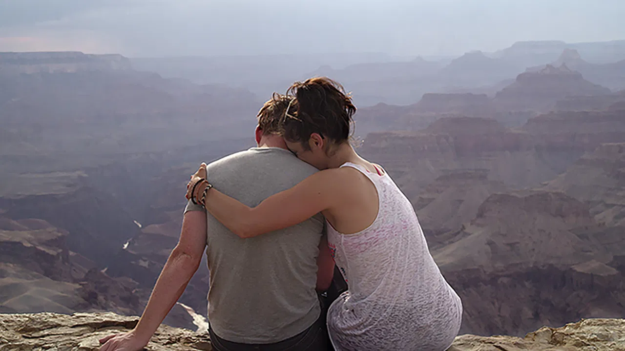 West of Her backdrop