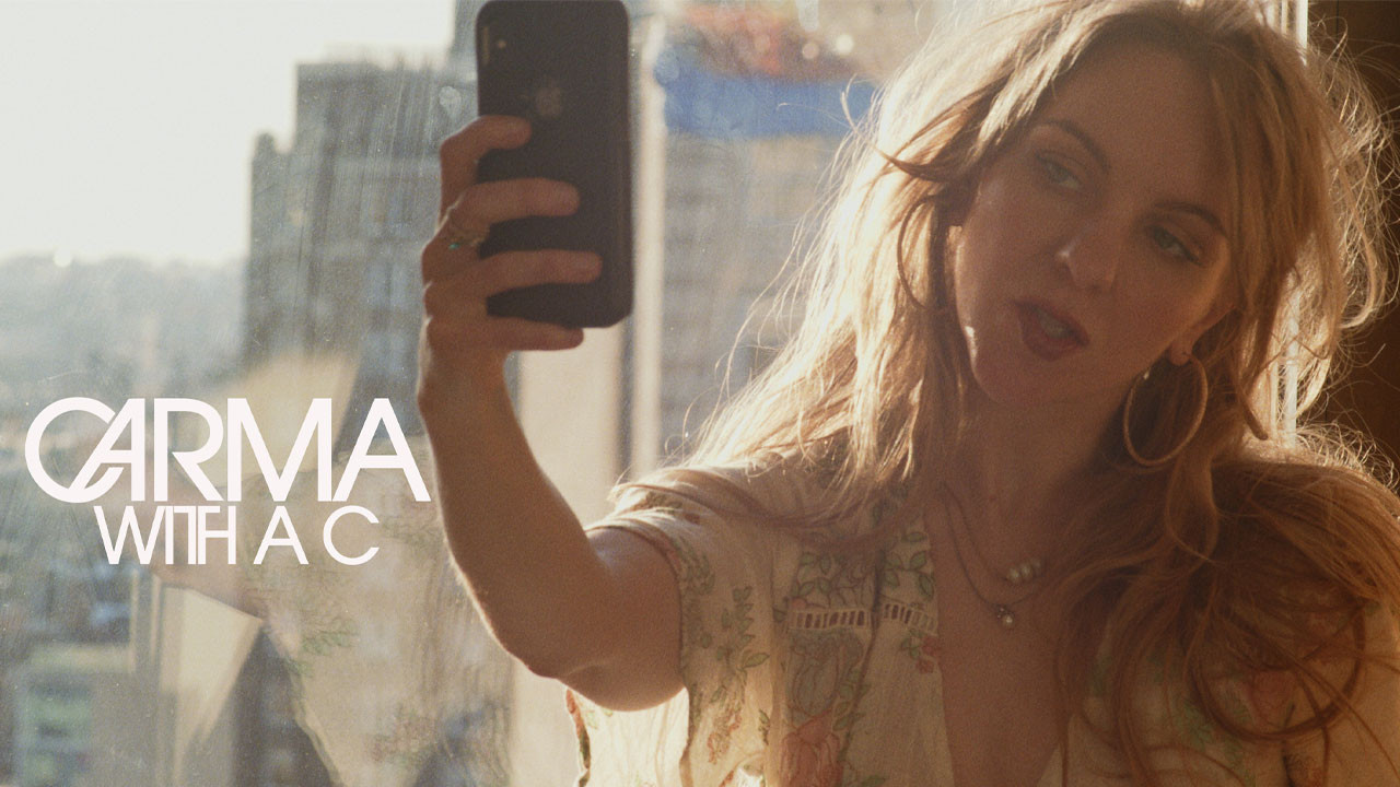 Carma with a C backdrop