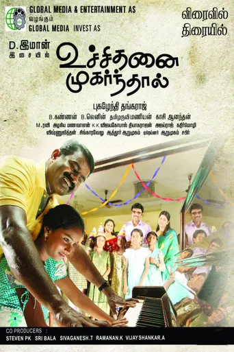 Uchithanai Muharnthaal poster