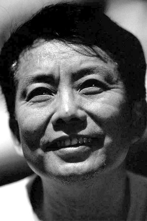 Huang Jianxin profile