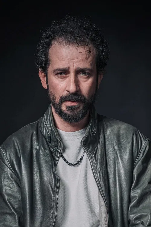 Özay Özgüler profile