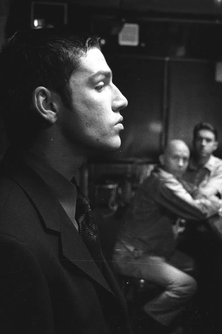 The Black Suit poster background