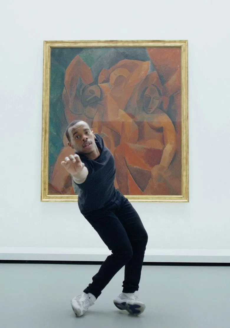 Lil Buck at Fondation Louis Vuitton poster background