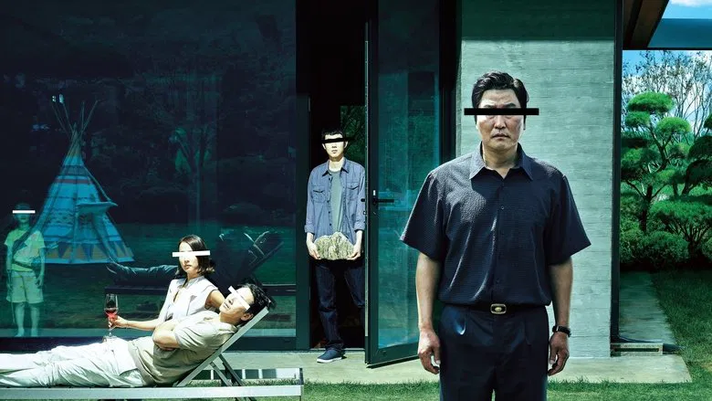 The Kim family hiding under the table in the Park living room