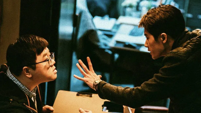 Li Qi using sign language with an intense expression