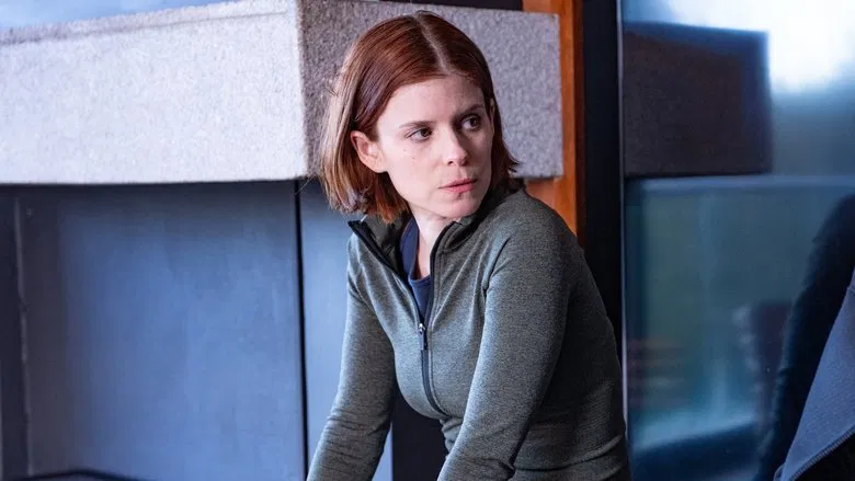 Sam staring out the window at the mysterious lights