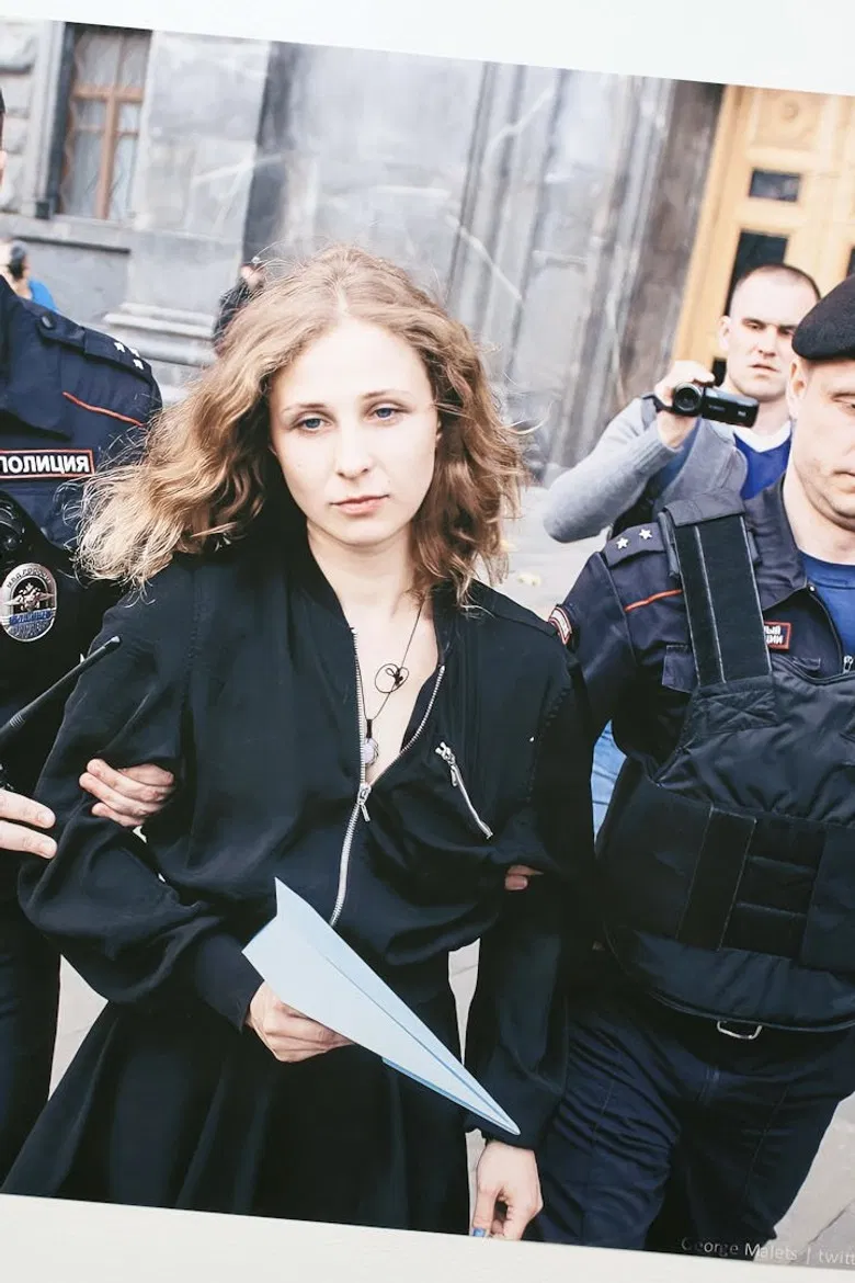 Pussy Riot: Can You Fight With Paper Planes poster background